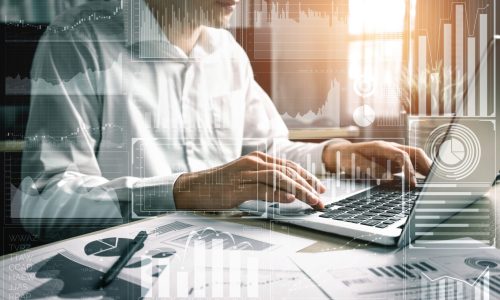 Big Data Technology for Business Finance Analytic Concept. Modern graphic interface shows massive information of business sale report, profit chart and stock market trends analysis on screen monitor.